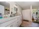 Clean bathroom with double vanity, shower, and updated fixtures at 1123 Golden Maple Ln, Chester, SC 29706