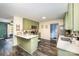 Modern kitchen with light green cabinets, quartz countertops, and stainless steel appliances at 1123 Golden Maple Ln, Chester, SC 29706