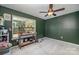 Multi-purpose bedroom or home office with dark green walls and large window at 1123 Golden Maple Ln, Chester, SC 29706