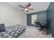 Versatile bedroom with a day bed, workspace, and ceiling fan at 1123 Golden Maple Ln, Chester, SC 29706