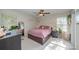 Cozy bedroom with a double bed, ceiling fan, and large windows at 1123 Golden Maple Ln, Chester, SC 29706
