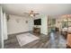 Open living room and kitchen with hardwood floors and a ceiling fan at 1123 Golden Maple Ln, Chester, SC 29706
