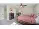 Bright bedroom featuring a queen bed, ceiling fan, and ample closet space at 1123 Golden Maple Ln, Chester, SC 29706