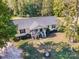 Ranch home with a spacious yard, driveway, and porch at 1123 Golden Maple Ln, Chester, SC 29706