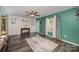 Living room with hardwood floors, a ceiling fan, and neutral color palette at 1123 Golden Maple Ln, Chester, SC 29706