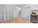 Kitchen features white cabinets, granite countertops and wine cooler at 4194 Pointe Norman Dr, Sherrills Ford, NC 28673