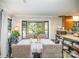 Charming dining area with bay window and kitchen access at 681 Pine Bluff Cir, Kannapolis, NC 28081