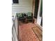 Inviting front porch with two comfy chairs and a welcoming mat at 681 Pine Bluff Cir, Kannapolis, NC 28081