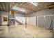 Partially finished basement offering extra space and a staircase at 681 Pine Bluff Cir, Kannapolis, NC 28081
