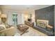 Comfortable Gathering room with fireplace and access to patio at 681 Pine Bluff Cir, Kannapolis, NC 28081