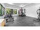 Home gym featuring various exercise equipment at 13702 Sage Thrasher Ln, Charlotte, NC 28278