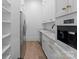 Well-equipped pantry with ample shelving and built in coffee maker at 13702 Sage Thrasher Ln, Charlotte, NC 28278