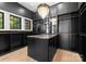 Large walk-in closet with island and abundant storage at 13702 Sage Thrasher Ln, Charlotte, NC 28278