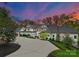 Luxury home exterior with driveway and landscaping at 13702 Sage Thrasher Ln, Charlotte, NC 28278