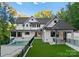 Luxury home with pool and lush green lawn at 13702 Sage Thrasher Ln, Charlotte, NC 28278