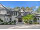 Modern white home with black accents and landscaping at 13702 Sage Thrasher Ln, Charlotte, NC 28278