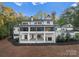 Two-story home with large deck and screened porch at 13702 Sage Thrasher Ln, Charlotte, NC 28278