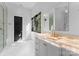 Luxurious bathroom with onyx countertop and marble floors at 13702 Sage Thrasher Ln, Charlotte, NC 28278