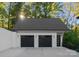 Detached three-car garage with modern design at 13702 Sage Thrasher Ln, Charlotte, NC 28278