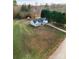 Aerial view of a ranch home with a large backyard and trampoline at 418 Summer Ridge Rd, Stanley, NC 28164