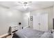 Comfortable bedroom with double-door closet and ceiling fan at 418 Summer Ridge Rd, Stanley, NC 28164