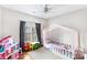 bedroom with a canopy bed, colorful accents and toys at 418 Summer Ridge Rd, Stanley, NC 28164