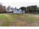 Gray house with a large yard and mature trees at 418 Summer Ridge Rd, Stanley, NC 28164