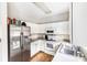 L-shaped kitchen with white cabinets, stainless steel appliances at 418 Summer Ridge Rd, Stanley, NC 28164