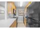 Modern galley kitchen with stainless steel appliances at 211 Heritage Blvd, Fort Mill, SC 29715