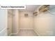 Spacious walk-in closet with wire shelving at 5084 Silver Creek Ln, Denver, NC 28037