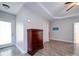 Bedroom with wood floors, door to exterior, and dresser at 104 Aberdeen Dr, Troutman, NC 28166