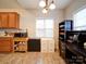 Kitchen dining area with wood-look floors and a home office at 104 Aberdeen Dr, Troutman, NC 28166