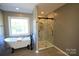 Elegant bathroom with a soaking tub and walk-in shower at 500 Pearl Place Ln, York, SC 29745