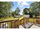 Spacious backyard with storage sheds and mature trees at 2275 Lipe Rd, China Grove, NC 28023