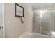 Modern bathroom with a walk-in shower and neutral color palette at 1320 Fillmore Ave, Charlotte, NC 28203