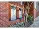 Brick front exterior with landscaping and a small front yard at 1320 Fillmore Ave, Charlotte, NC 28203