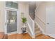 Modern staircase with white railing leading to upper level at 1320 Fillmore Ave, Charlotte, NC 28203