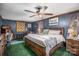 Spacious main bedroom with large bed and ceiling fan at 120 Forest St, Rockwell, NC 28138