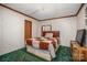 Bedroom with double bed and green carpet at 120 Forest St, Rockwell, NC 28138