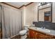Simple bathroom with a toilet, sink, and shower at 120 Forest St, Rockwell, NC 28138