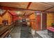 Partially finished basement with wooden walls and storage space at 120 Forest St, Rockwell, NC 28138