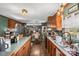 Open kitchen boasting wood cabinets and breakfast bar at 120 Forest St, Rockwell, NC 28138
