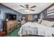 Spacious main bedroom with large bed and ceiling fan at 120 Forest St, Rockwell, NC 28138