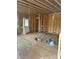 Unfinished interior with exposed framing and door at 1506 7Th St, Statesville, NC 28677