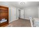 Bedroom with bookcase, hardwood floors, and ample space at 240 S Center St, Taylorsville, NC 28681