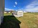 Metal storage shed in backyard with adjacent grassy area at 402 Beaver Dam Church Rd, Shelby, NC 28152