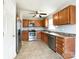 Kitchen boasts stainless steel appliances and wood cabinets at 402 Beaver Dam Church Rd, Shelby, NC 28152