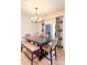 Bright dining room with a large table and bench seating at 1077 Hearth Sw Ln, Concord, NC 28025