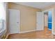 Bedroom with hardwood floors and access to other rooms at 114 Corban Se Ave, Concord, NC 28025