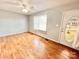Bright living room with hardwood floors, ceiling fan, and neutral walls at 2223 Chatham St, Newton, NC 28658
